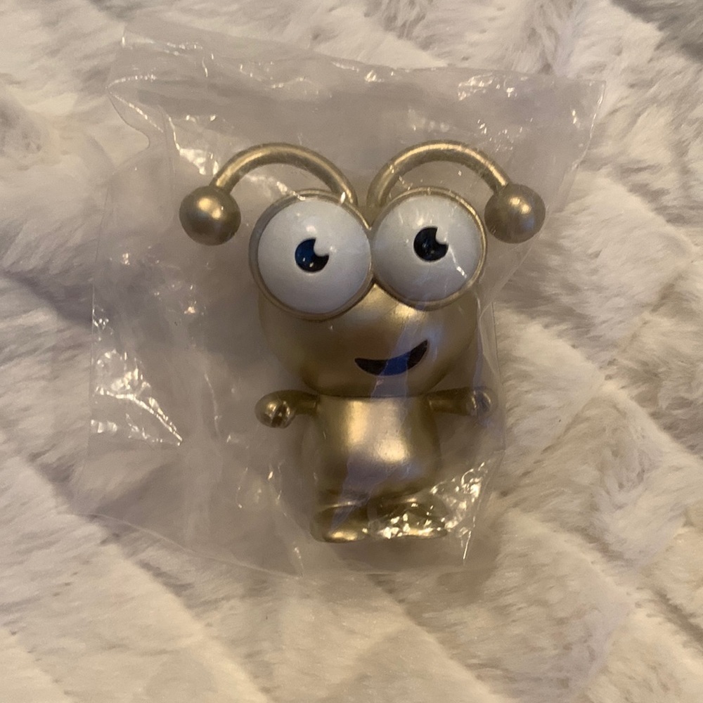 This is 1 of 2 Gold Cricut Cuties I have. It came in a Sealed Plastic Baggie bag